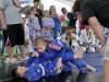 5x3.88    WVgames5      Arienna  Green, 10, of South Charleston takes down Ashton Francis, 9, of Morgantown during competition in Brazilian Jiu-Jitsu at Magic Island Saturday as part of the West Virginia Games.      Photo by chris dorst